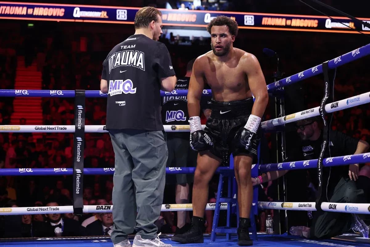 Boxer receiving instructions in the corner during match Boxer receiving instructions in the corner during match