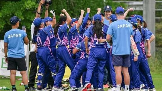 Équipe féminine du Japon célébrant une victoire Équipe féminine du Japon célébrant une victoire